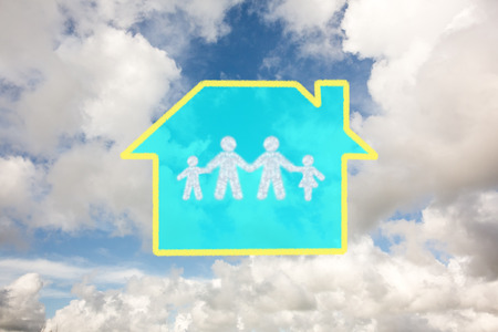 Cloud in shape of family against blue sky with white cloudsの写真素材