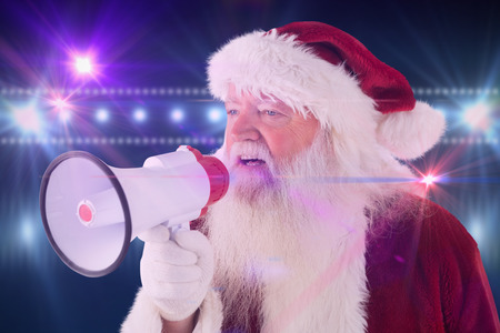 Santa Claus is using a megaphone against digitally generated nightlife light designの写真素材