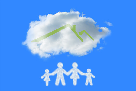 Cloud in shape of family against blue vignetteの写真素材