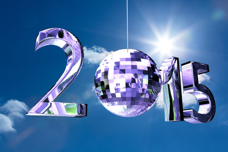 2015 against bright blue sky with cloudsの写真素材