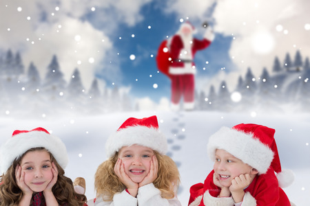 Cute children  against blue sky with white cloudsの写真素材