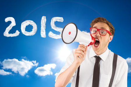 Geeky businessman shouting through megaphone against cloudy sky with sunshine