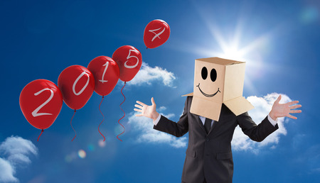 Anonymous businessman with hands out against bright blue sky with clouds