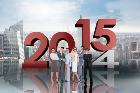 Business people against room with large window looking on cityの写真素材