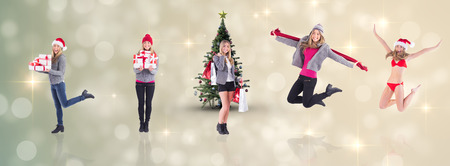 Festive fit blonde in red bikini against light design shimmering on silverの写真素材