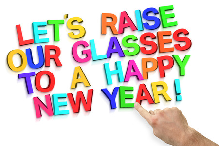 Hand pointing against new year greeting on white background