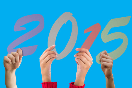 Hands holding poster against blue background with vignetteの写真素材