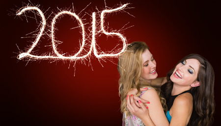 Friends hugging against red background with vignette