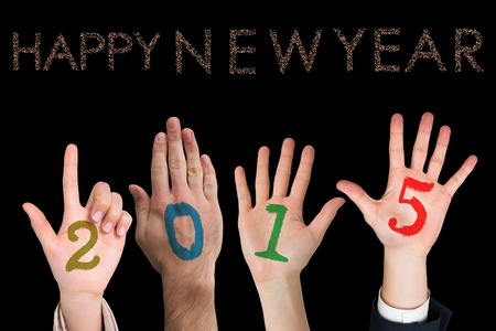 Hands against glittering happy new yearの写真素材