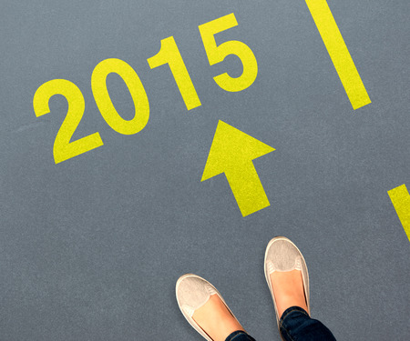 Casually dressed womans feet against greyの写真素材