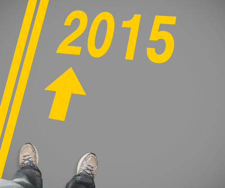 Casually dressed mans feet against greyの写真素材