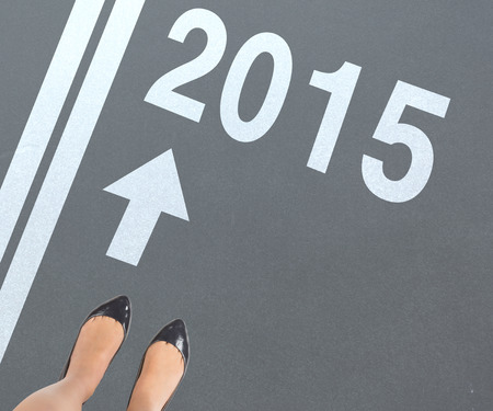 Businesswomans feet against greyの写真素材