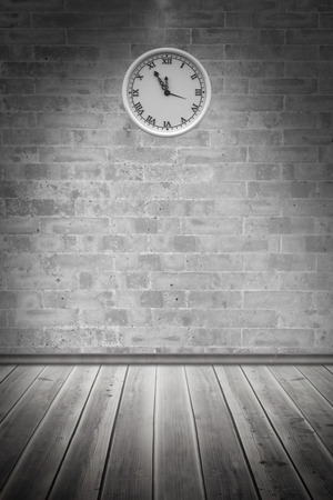 Clock against grey roomの写真素材