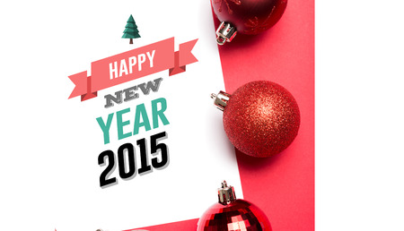 Happy new year against page surrounded by christmas baublesの写真素材