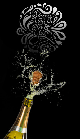 Elegant happy new year against champagne poppingの写真素材