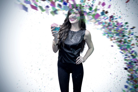 Brunette with cocktail against colour curve
