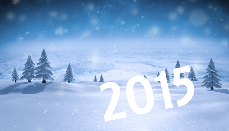 2015 against snowy landscape with fir trees