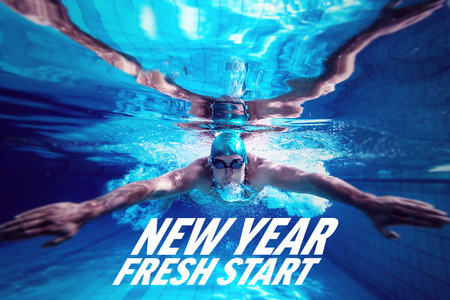 Fit swimmer training by himself against new year fresh start