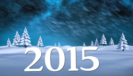 2015 against snowy landscape with fir treesの写真素材