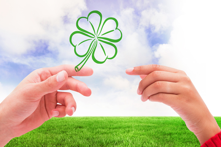Shamrock against green field