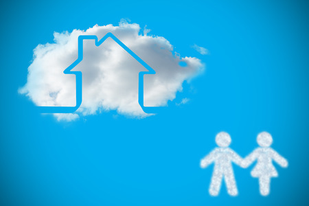 Cloud in shape of couple against blue background with vignetteの写真素材