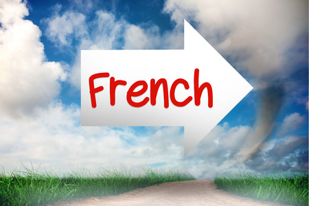 The word french and arrow against road leading out to the horizonの写真素材