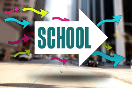 The word school and arrows against new york streetの写真素材