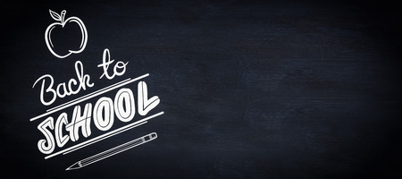 back to school against blackboardの写真素材