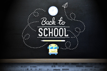 back to school against blackboard on wall