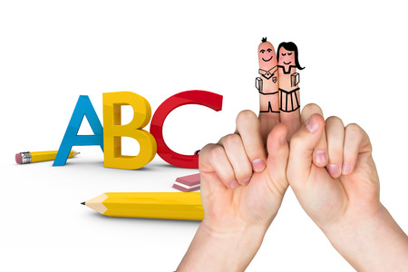 Fingers posed as students against abc graphicの写真素材
