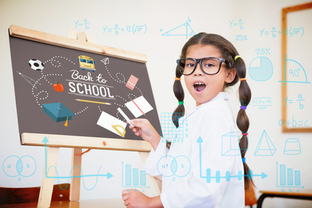 Maths against cute pupil dressed up as scientist in classroom