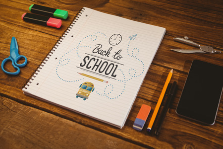 back to school against notepad on student deskの写真素材