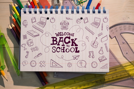 back to school against students table with school suppliesの写真素材