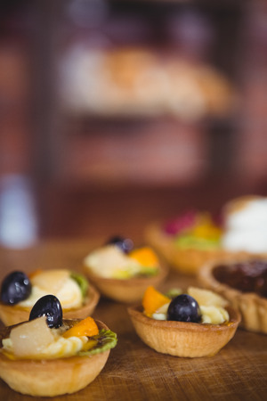 Little fruit pies on the counter at coffee shopの写真素材