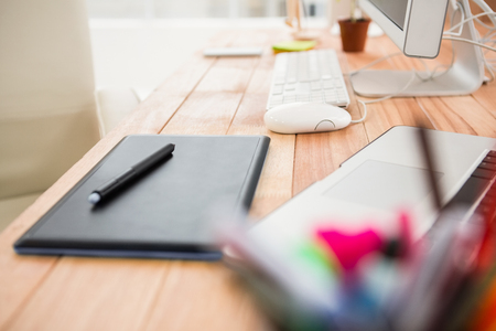 Close up view of digitizer on creative working desk in the officeの写真素材