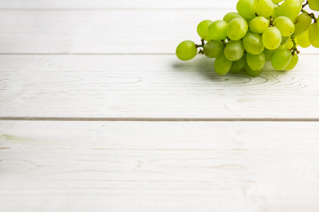 Bunch of grapes on table shot in studioの写真素材
