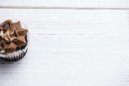Chocolate cupcake on a table shot in studioの写真素材