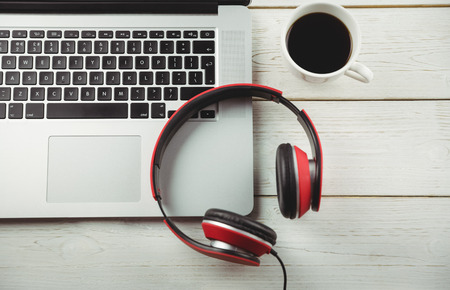 Overhead view of a desk with electronic devicesの写真素材
