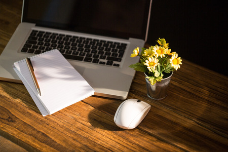Overhead view of an desk with electronic devicesの写真素材