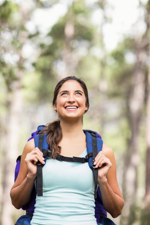 Happy jogger looking away in the natureの写真素材