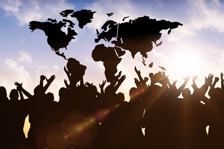 Silhouetters celebrating against sun shiningの写真素材