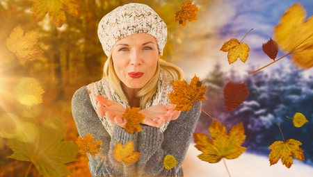 Happy winter blonde against autumn changing to winter