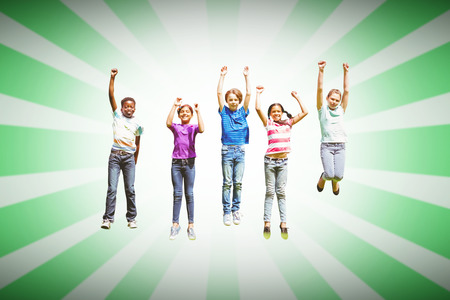 Children jumping at park against linear designの写真素材