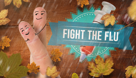 Fingers crossed like a couple against overhead of wooden planksの写真素材