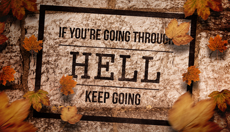 Composite image of motivational message against leaves background