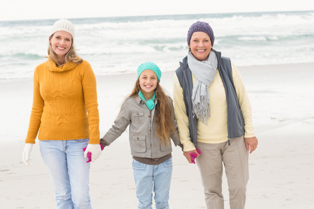 Multi generation family all together at the beachの写真素材