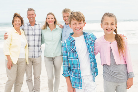 Multi generation family all together at the beach
