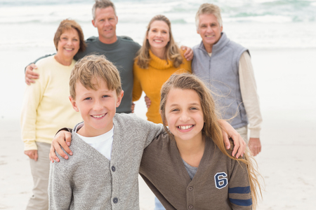 Multi generation family all together at the beach