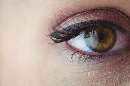 Eye with eyeliner and eyeshadow in close upの写真素材