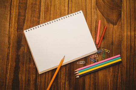 School supplies on desk with copy space shot in studioの写真素材